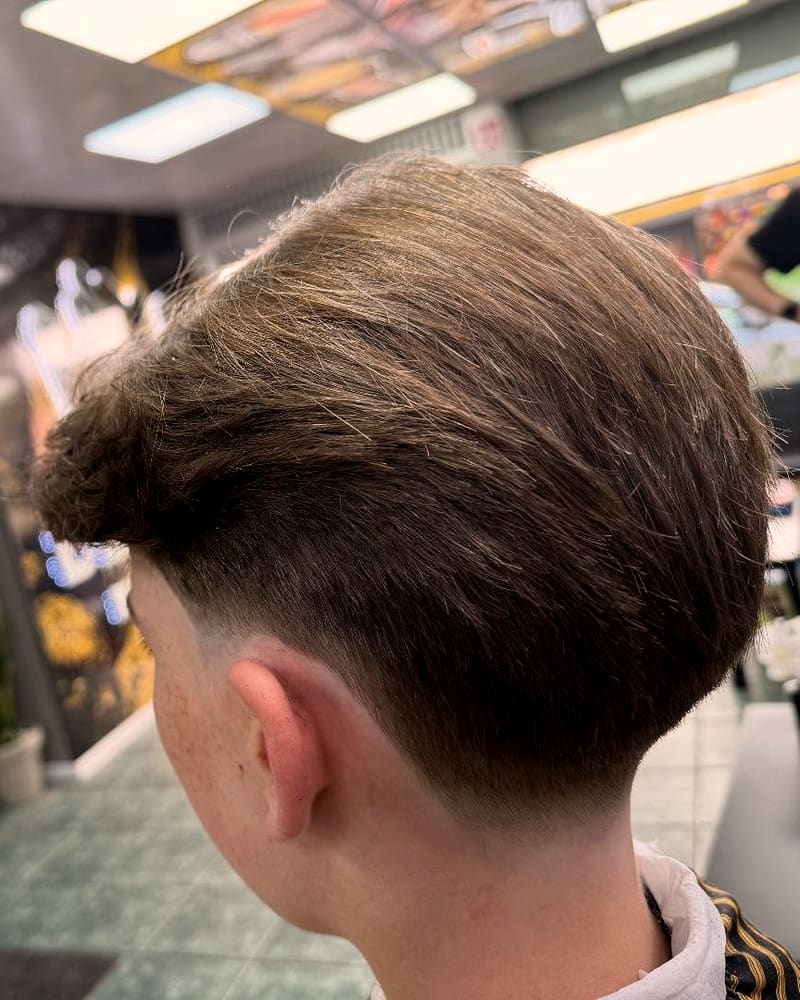 Taper fade met getextureerd, voller bovenhaar